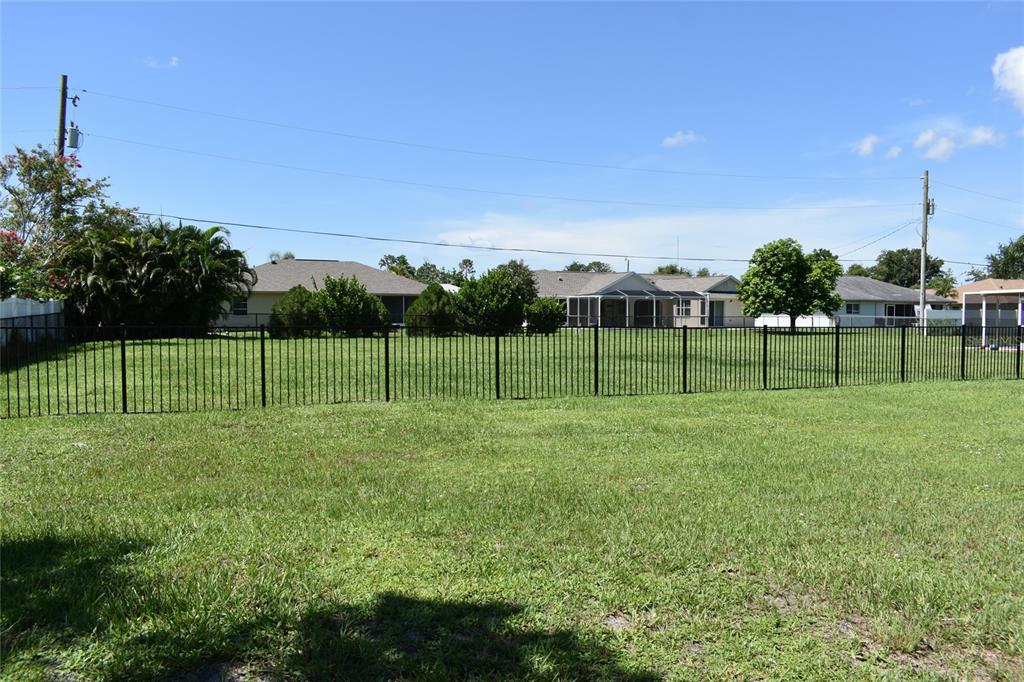 a view of a park with a big yard