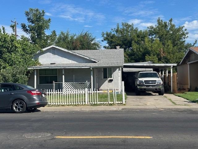 a car parked in front of a house