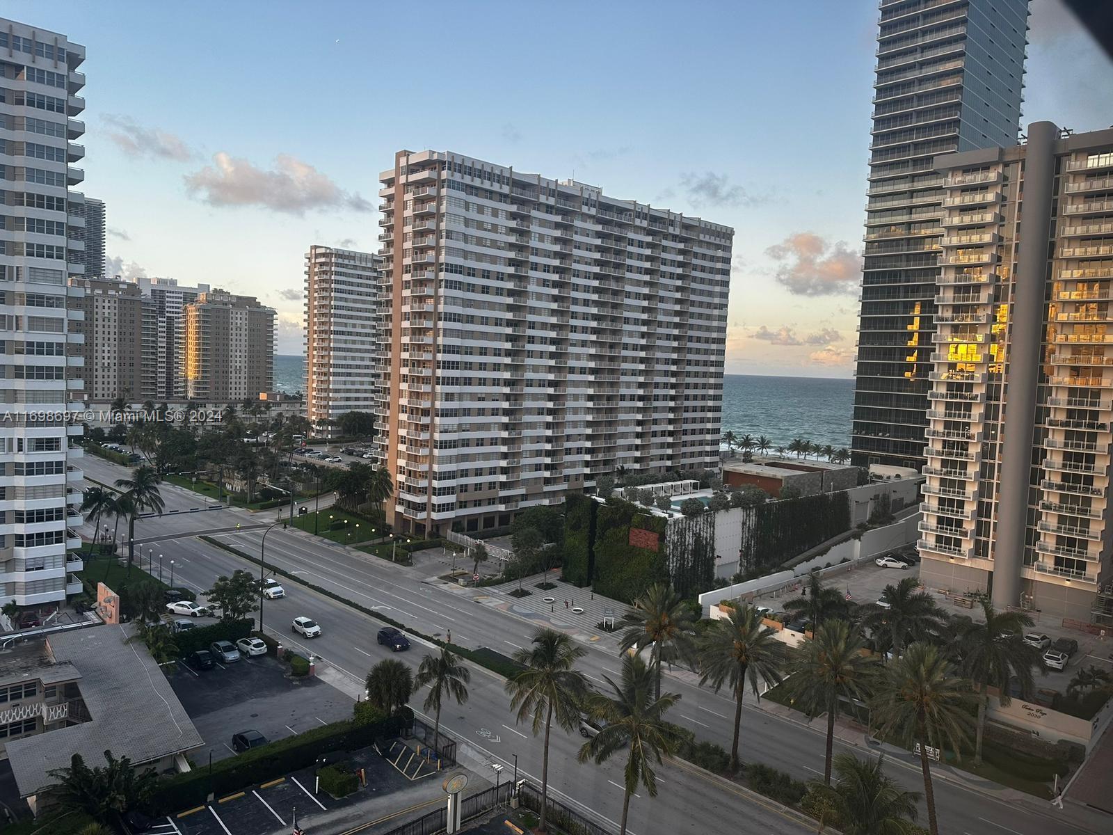 a view of a city with tall buildings