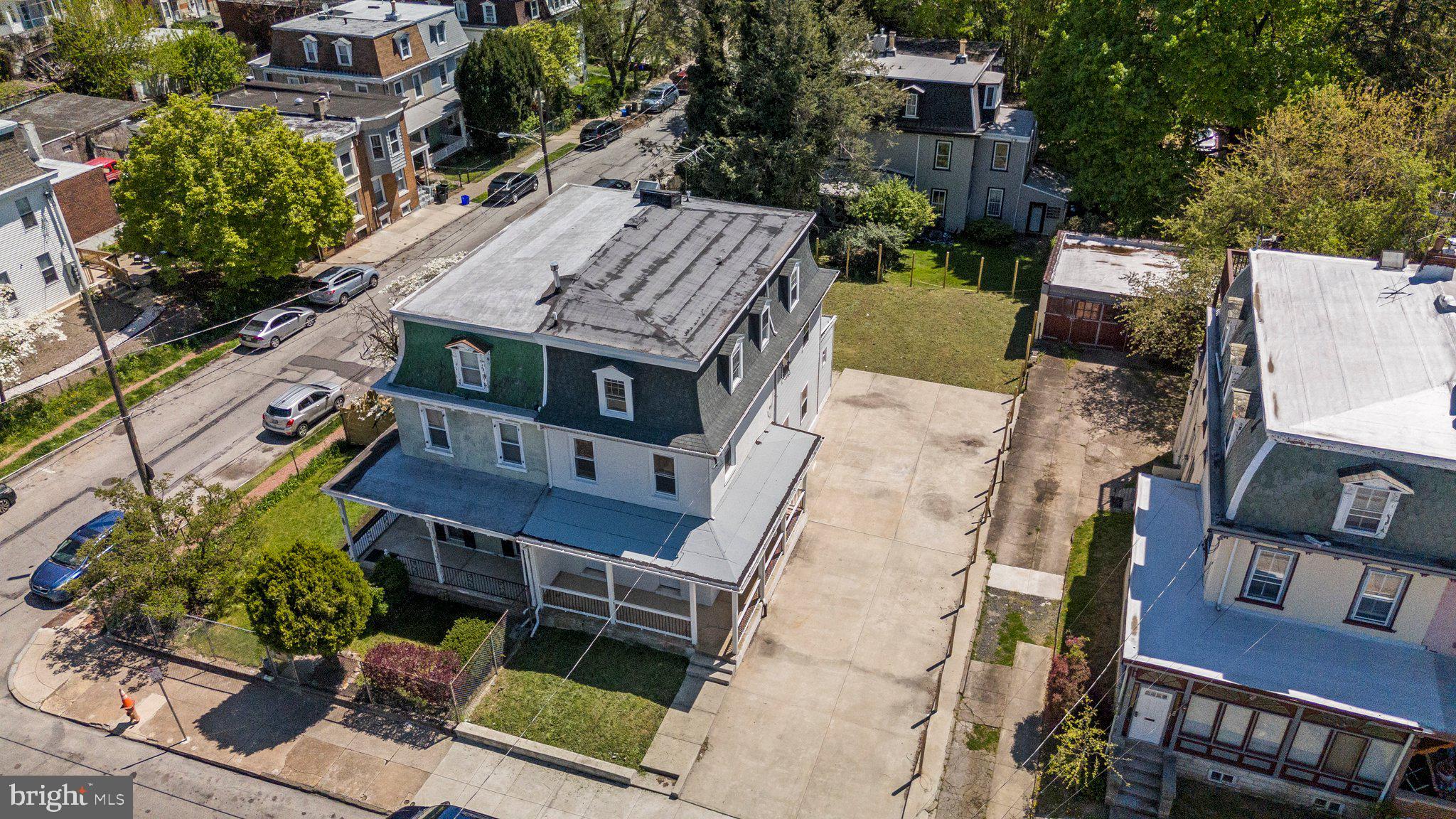 an aerial view of a house with a garden