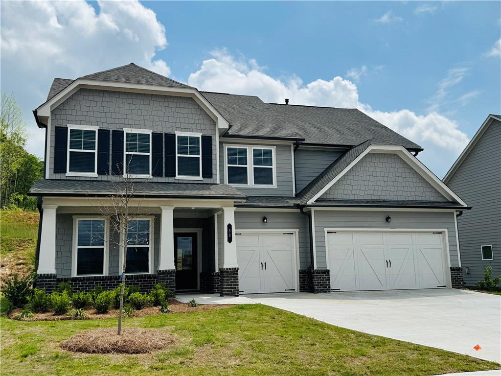 front view of a house with a yard