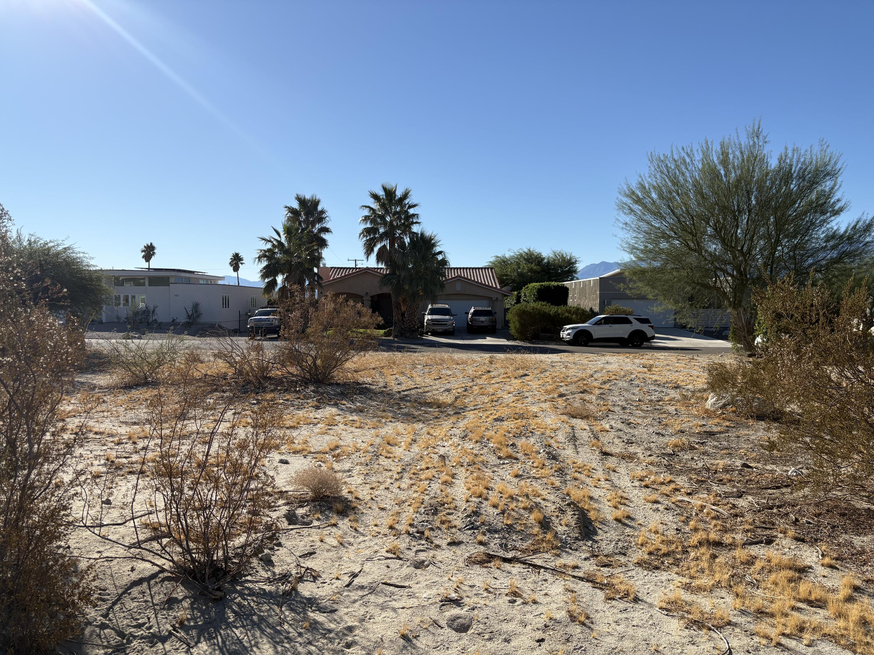 a view of outdoor space yard and blue kitchen