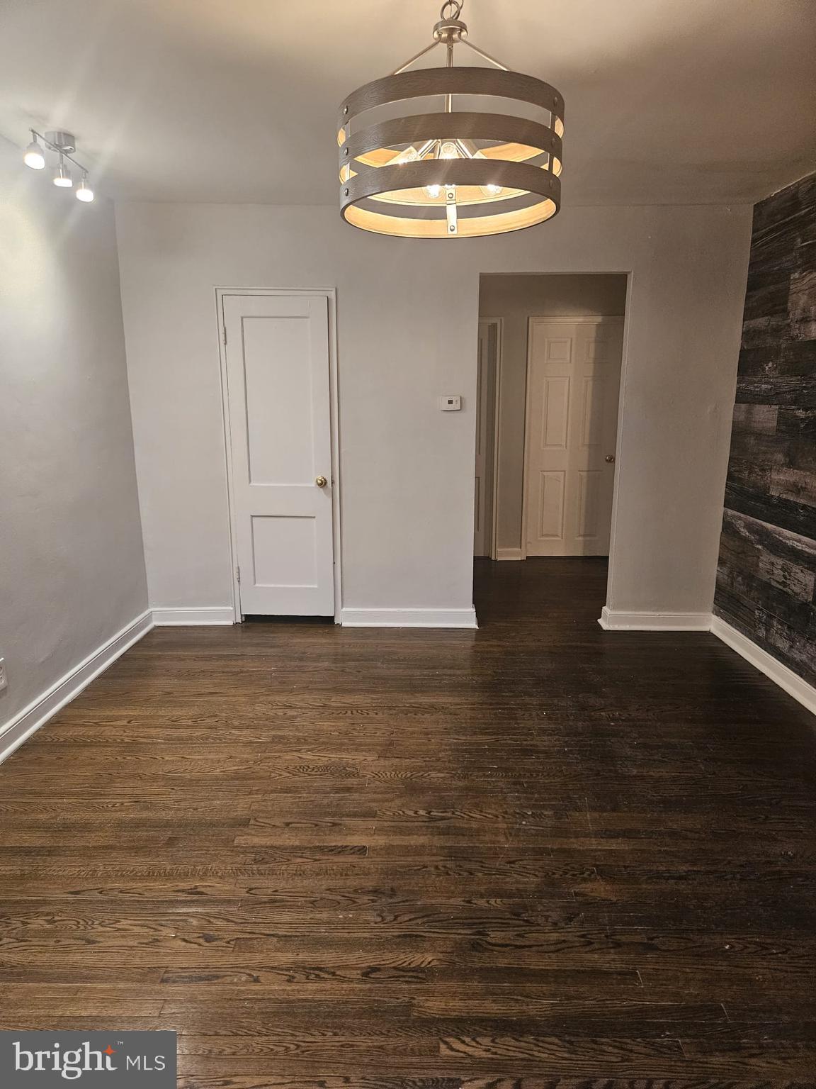 a view of a livingroom with wooden floor