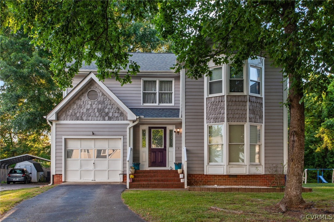 front view of a house with a yard