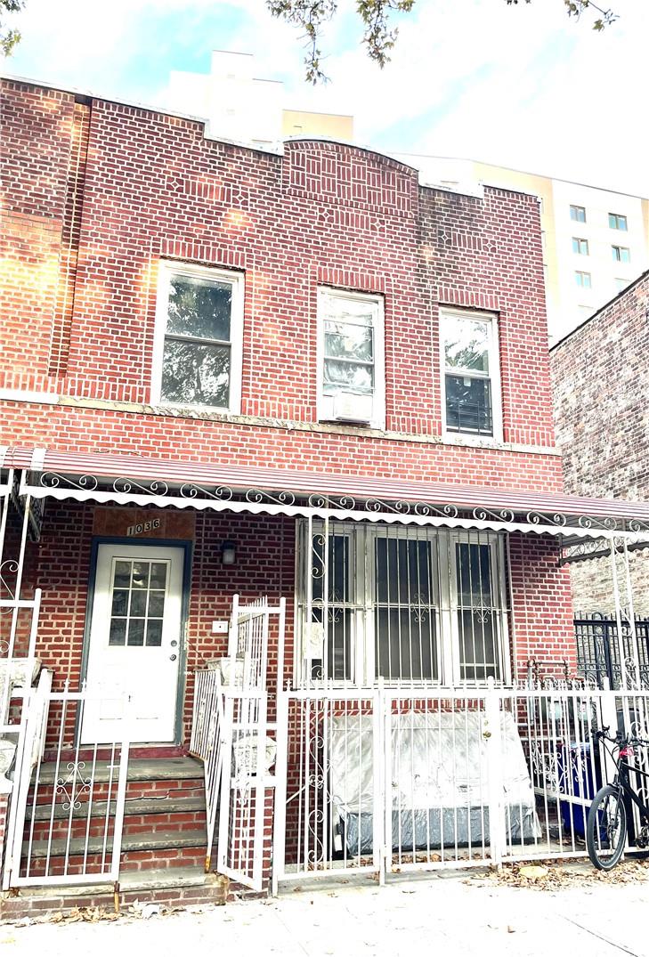 View of front facade featuring a porch