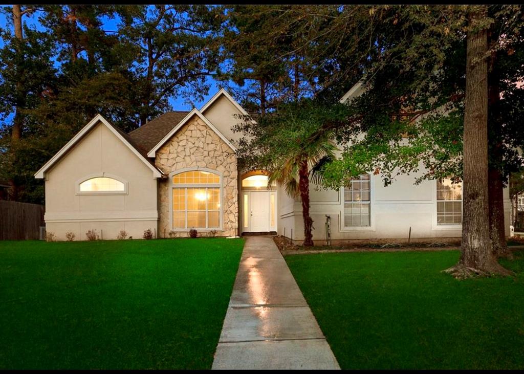 Front of home, garage off to right