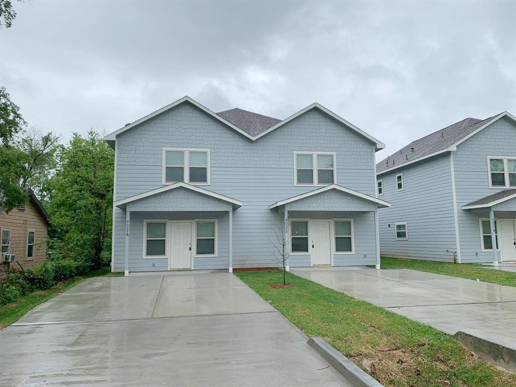 front view of a house and a yard