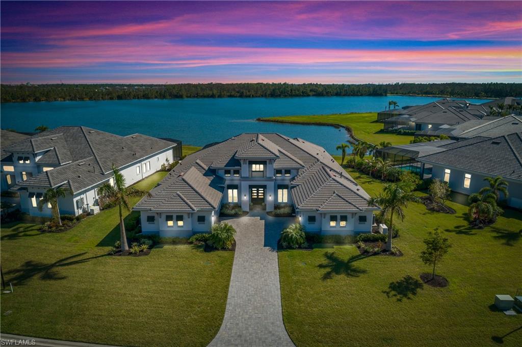 Offering nearly 4400 sqft of interior living space and a sprawling outdoor living area, this home is simply stunning.