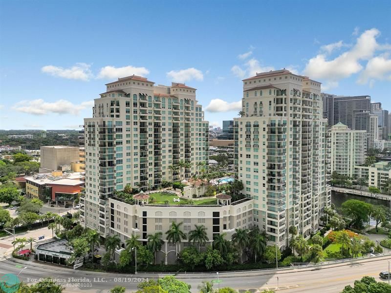 a view of a city with tall buildings