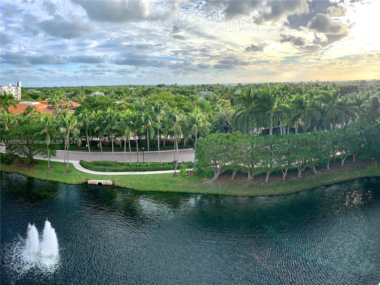 a view of a lake with a big yard