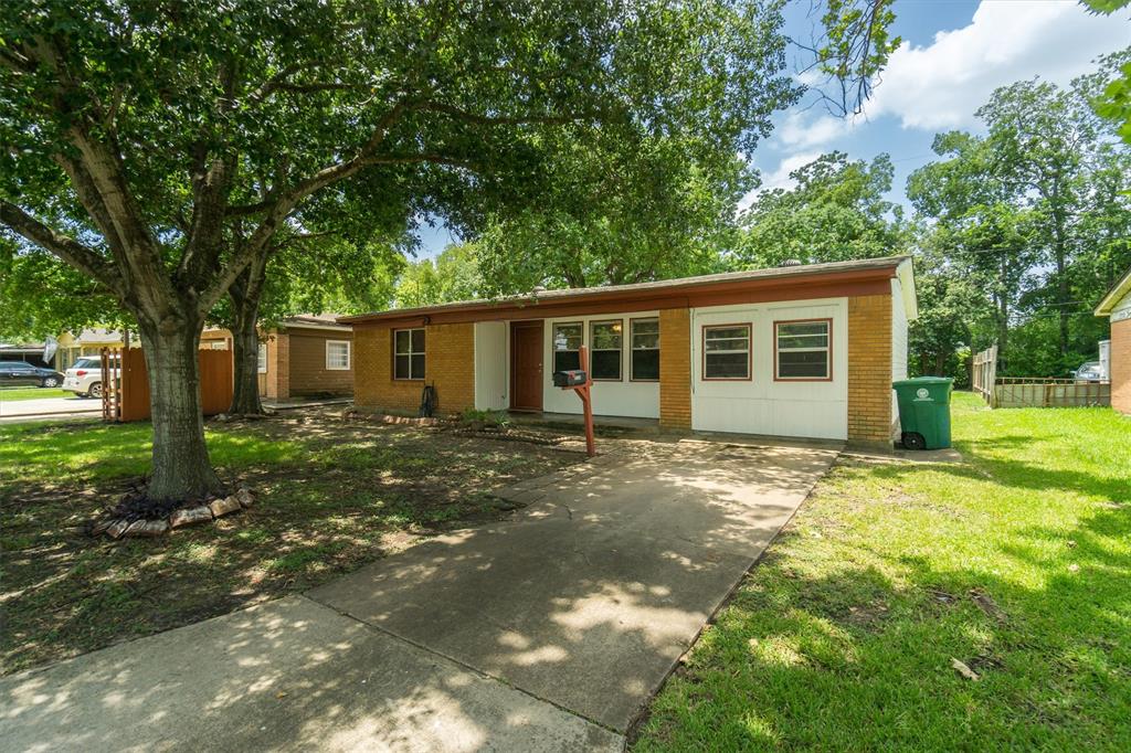 front view of a house with a patio