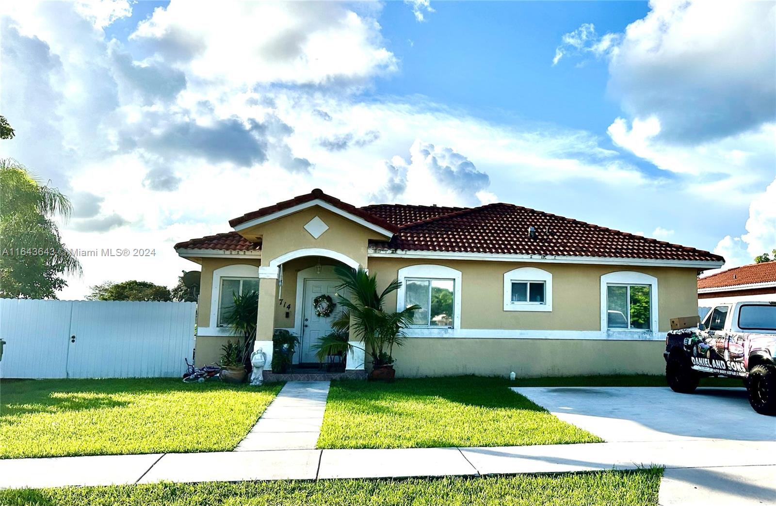 a view of front a house with a yard