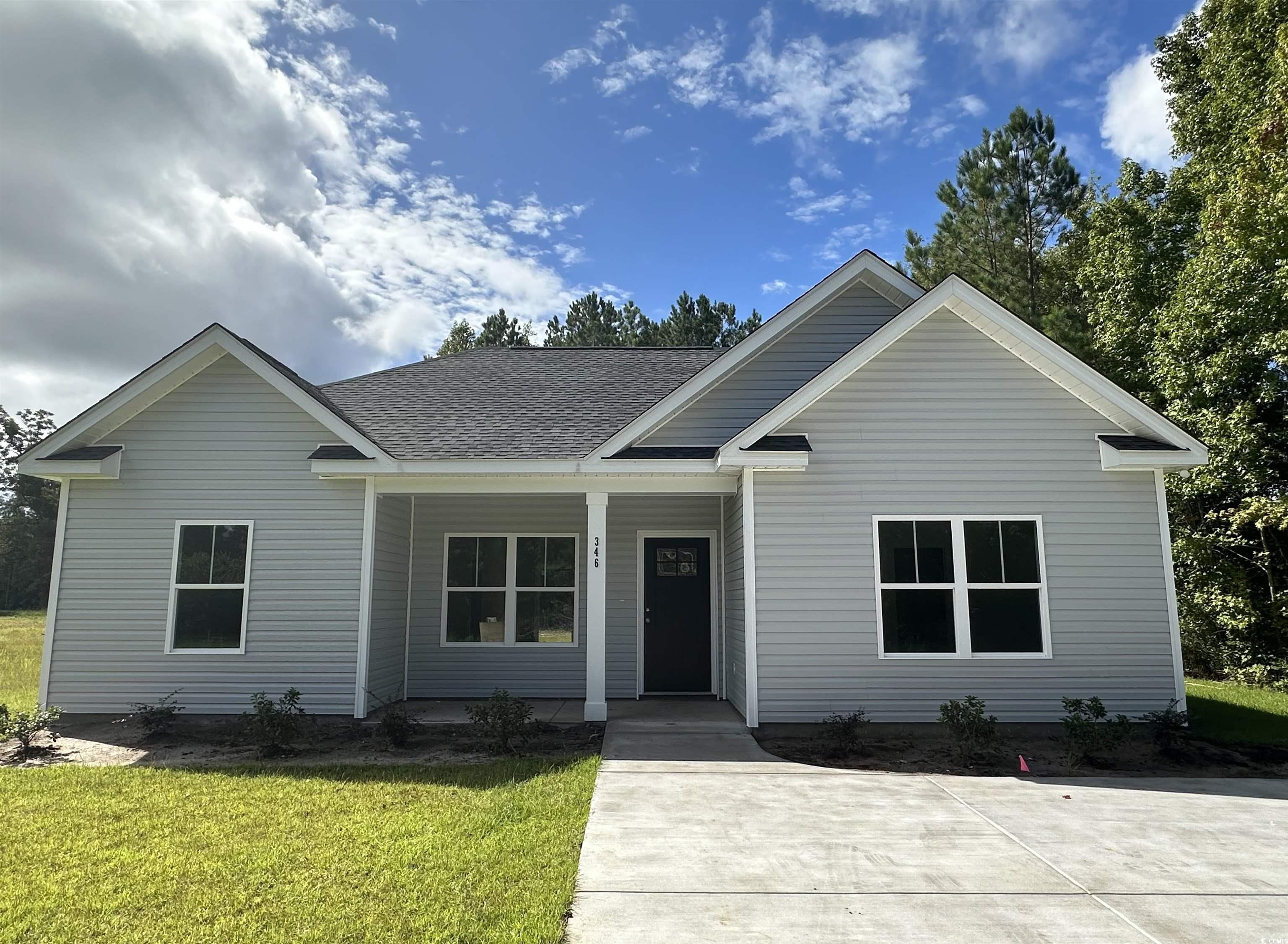 View of front of property featuring covered porch