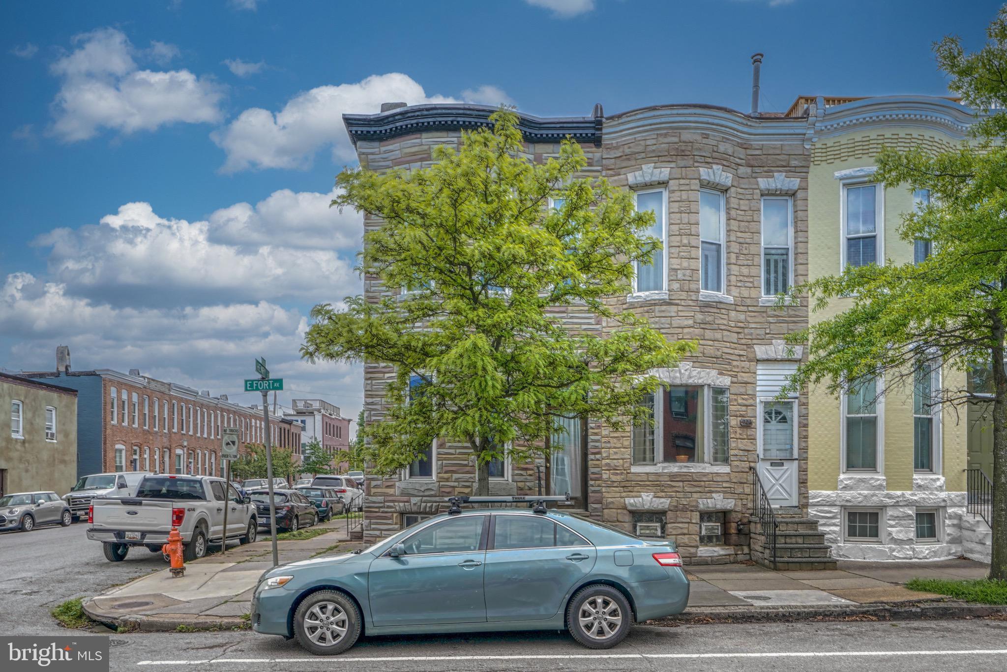 a car parked in front of a building