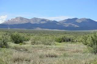 a view of mountains and valleys