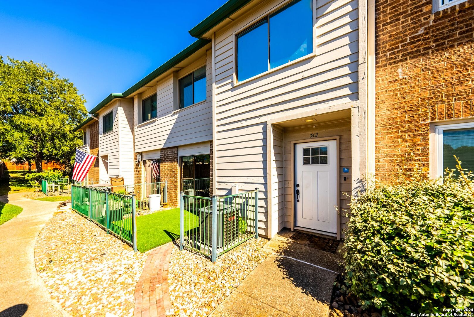 a view of a house with a patio