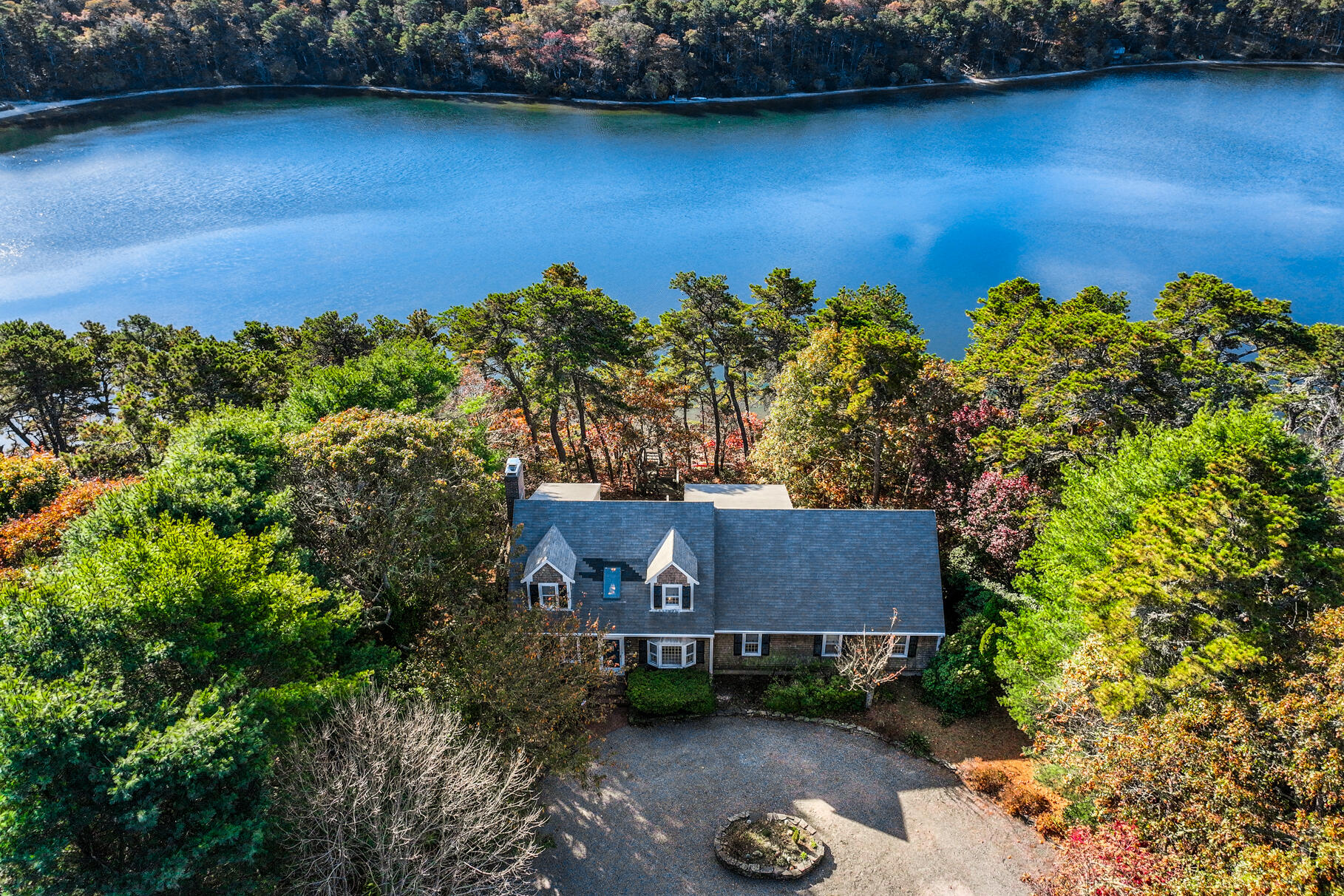 an aerial view of a house with garden space and outdoor space