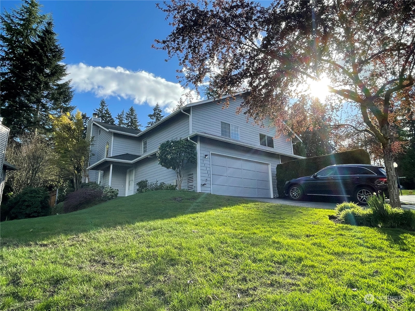 a view of a house with a back yard