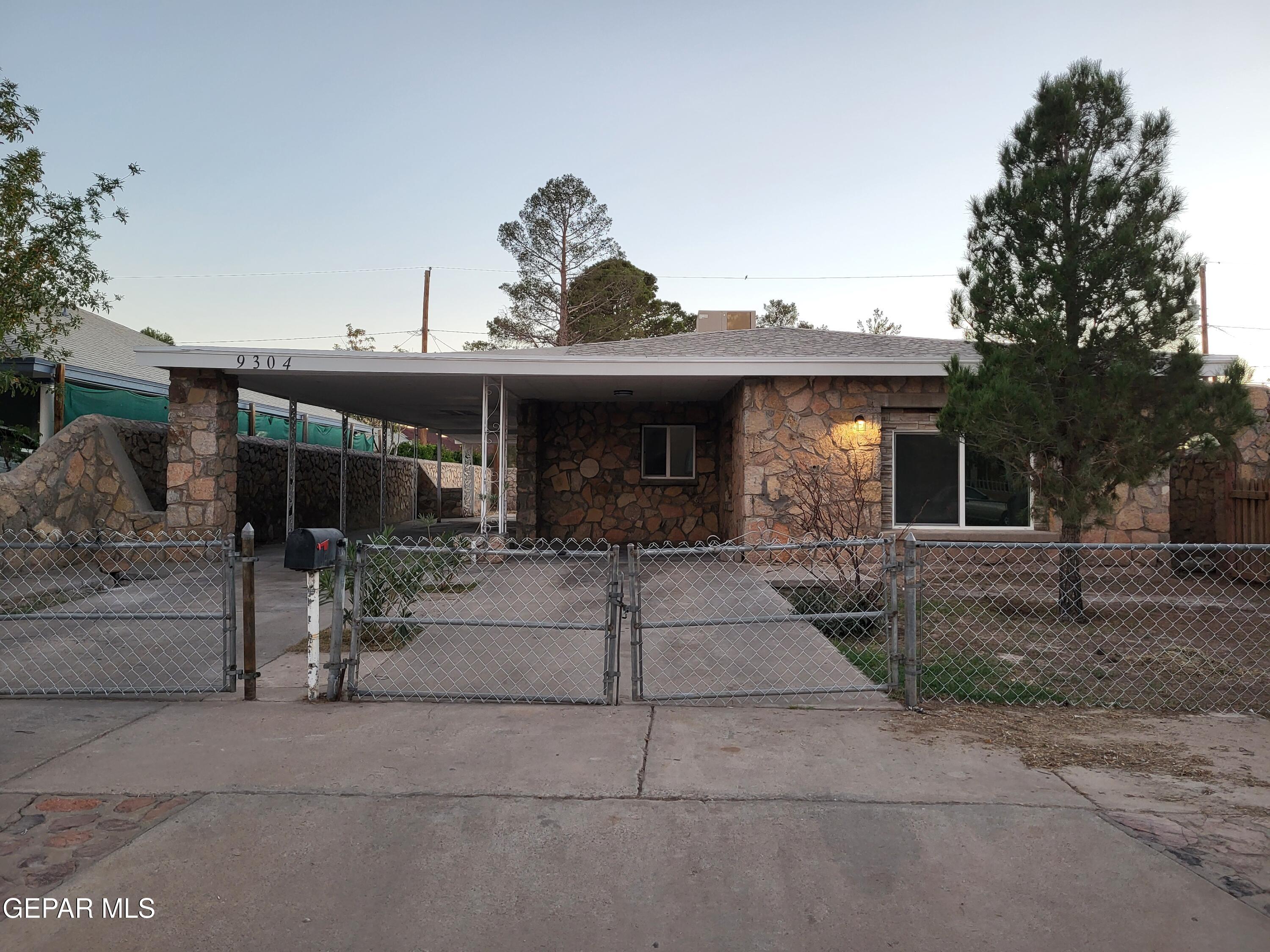 a front view of a house with garage