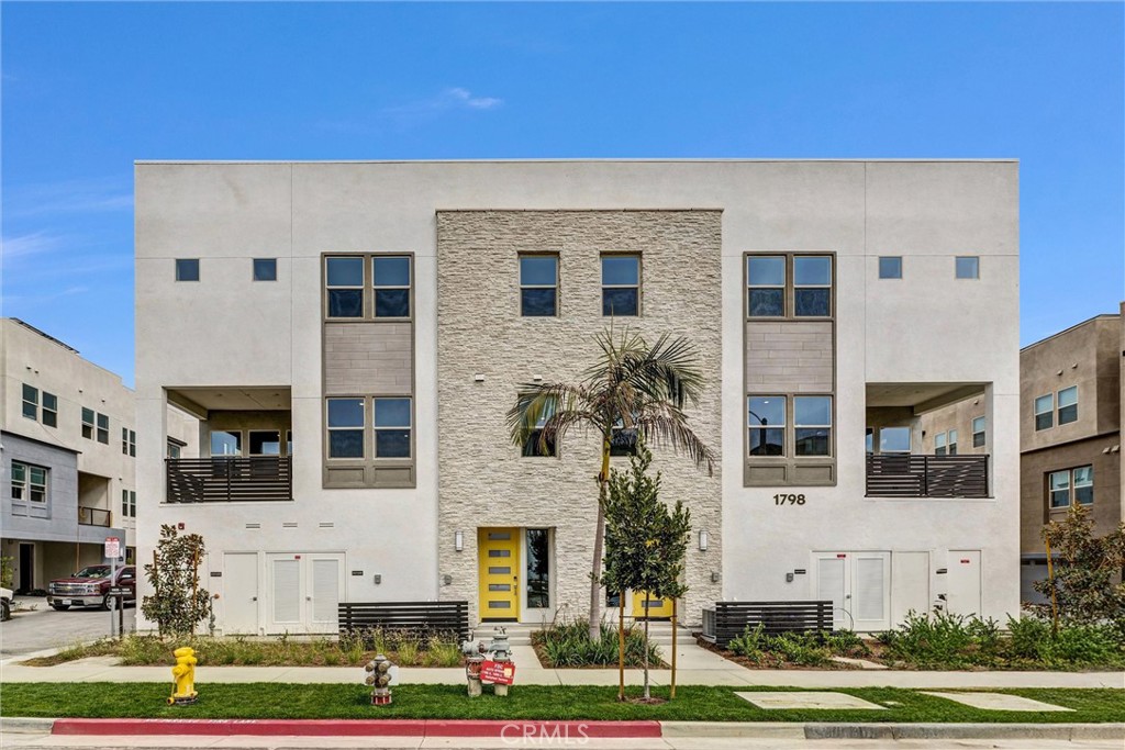 a front view of a building with yard