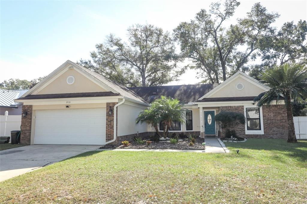 a front view of house with yard