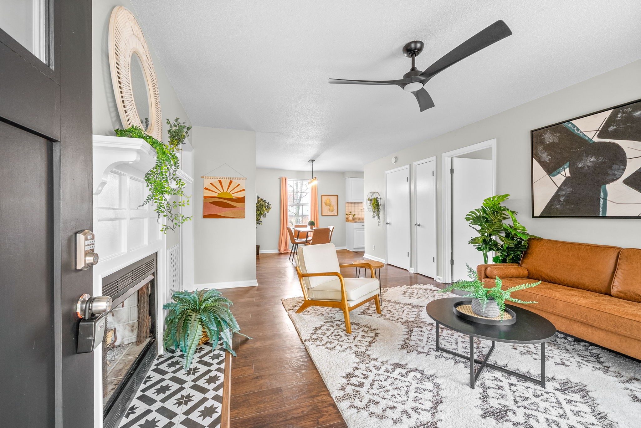 a living room with furniture and a rug