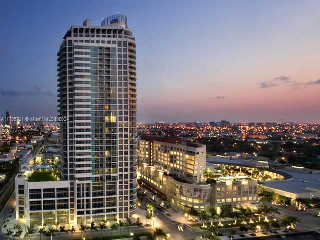 a view of a city with tall buildings