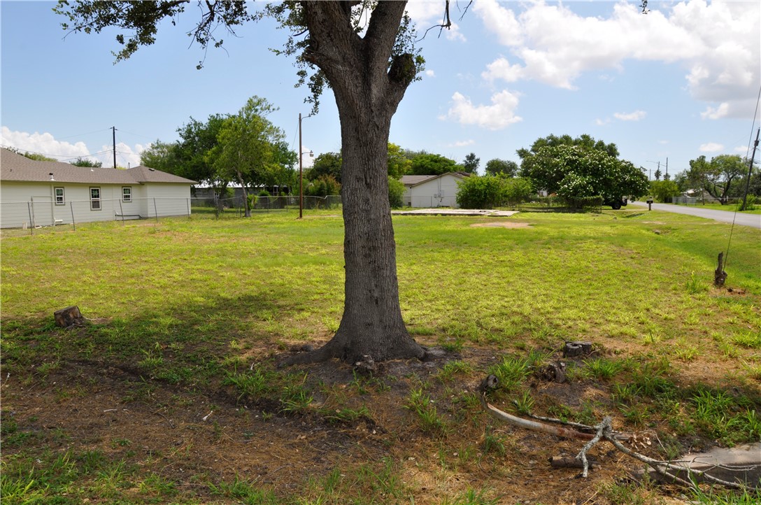 a view of a lake with a big yard