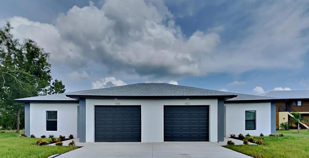 a front view of house with yard