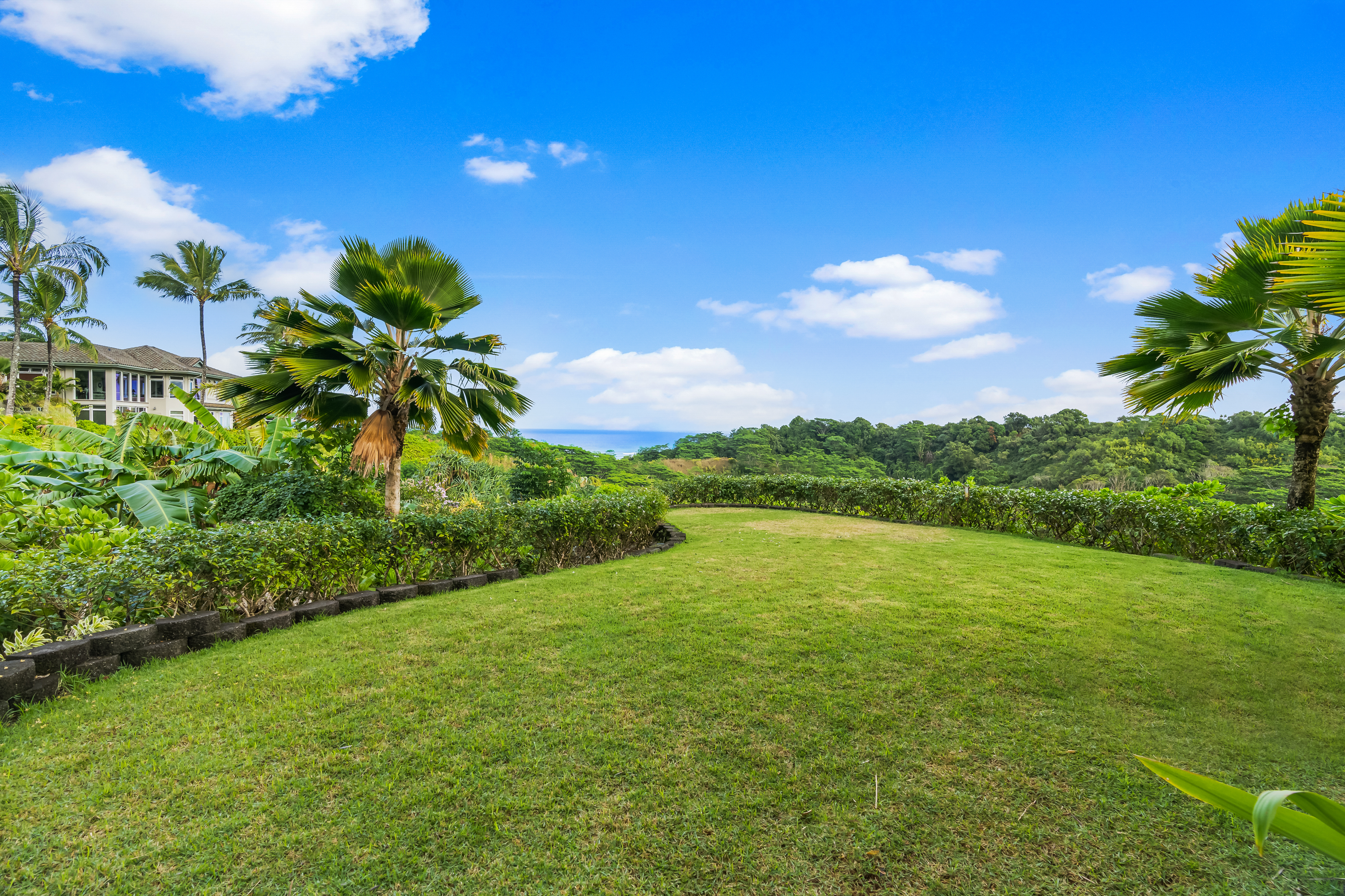 a view of a lake with a big yard