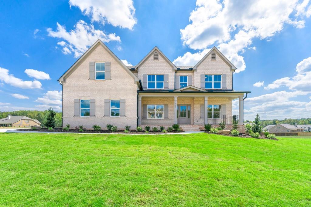 a view of a house with a big yard