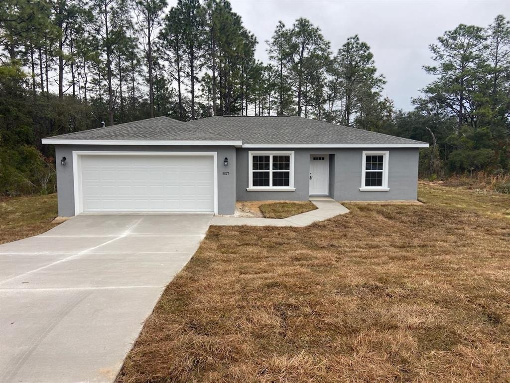 front view of house with a yard