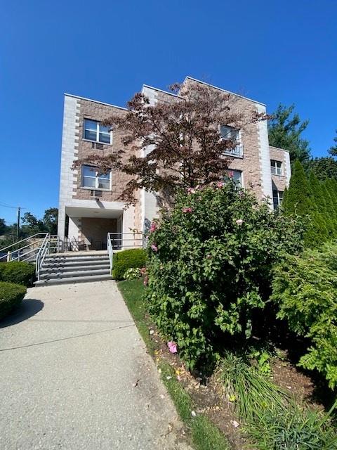 a view of a building and front view of a building