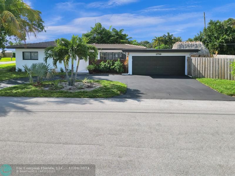 front view of house with a yard