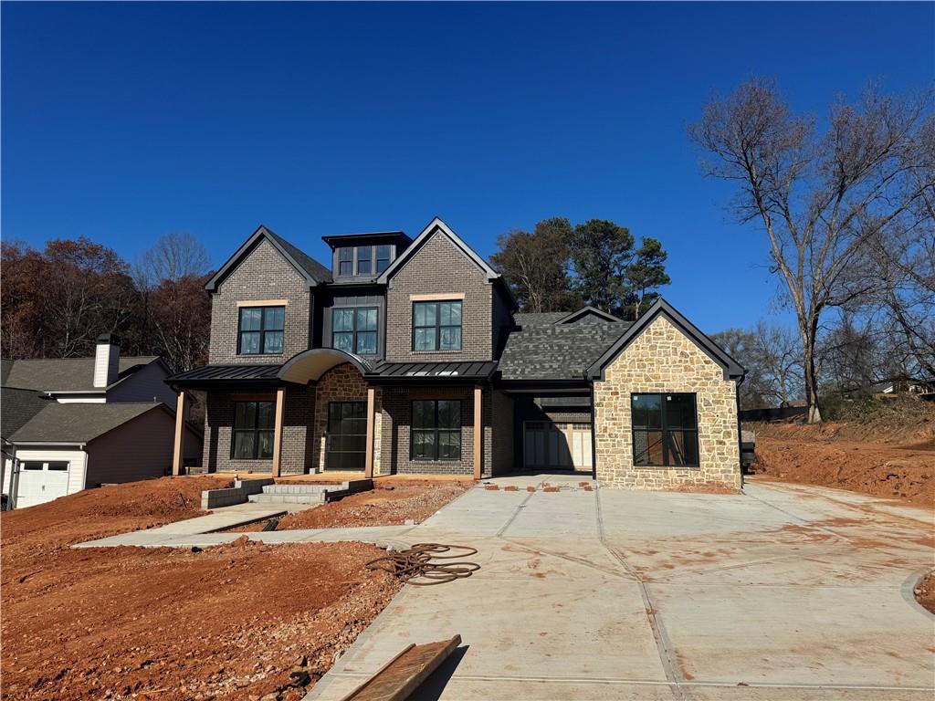 a front view of a house with garage