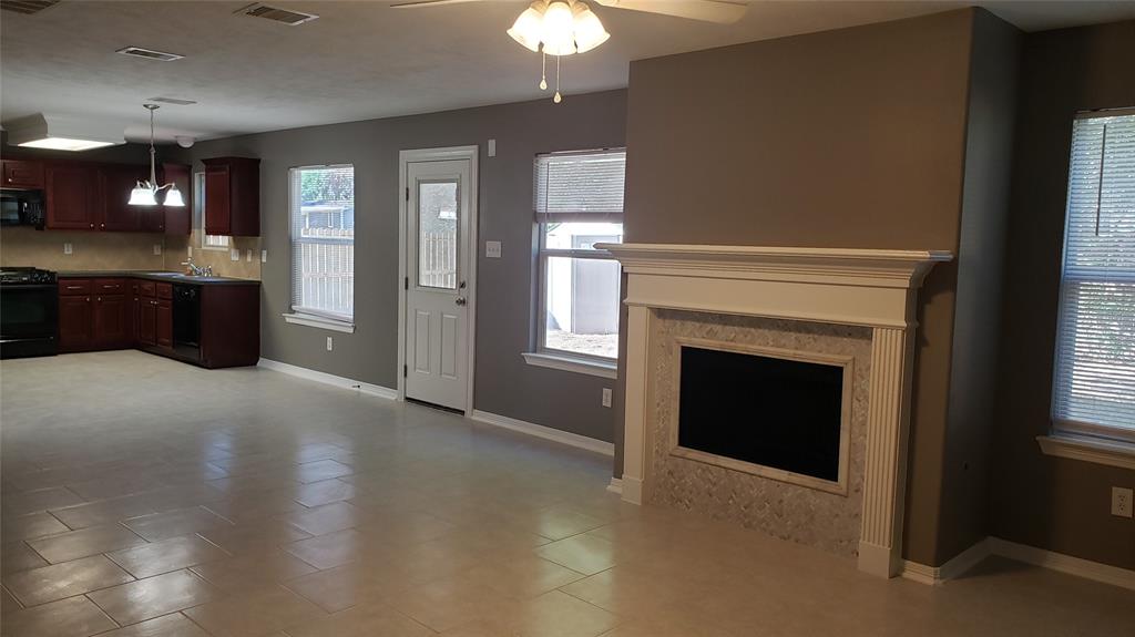 a view of a livingroom with a fireplace