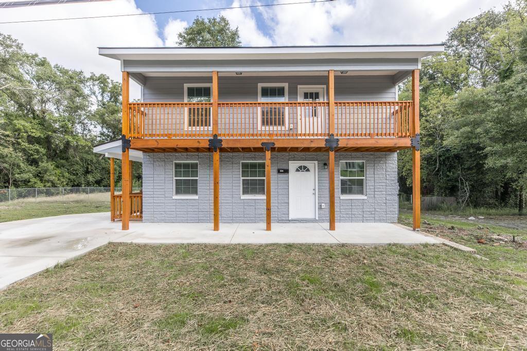 front view of a house with a yard