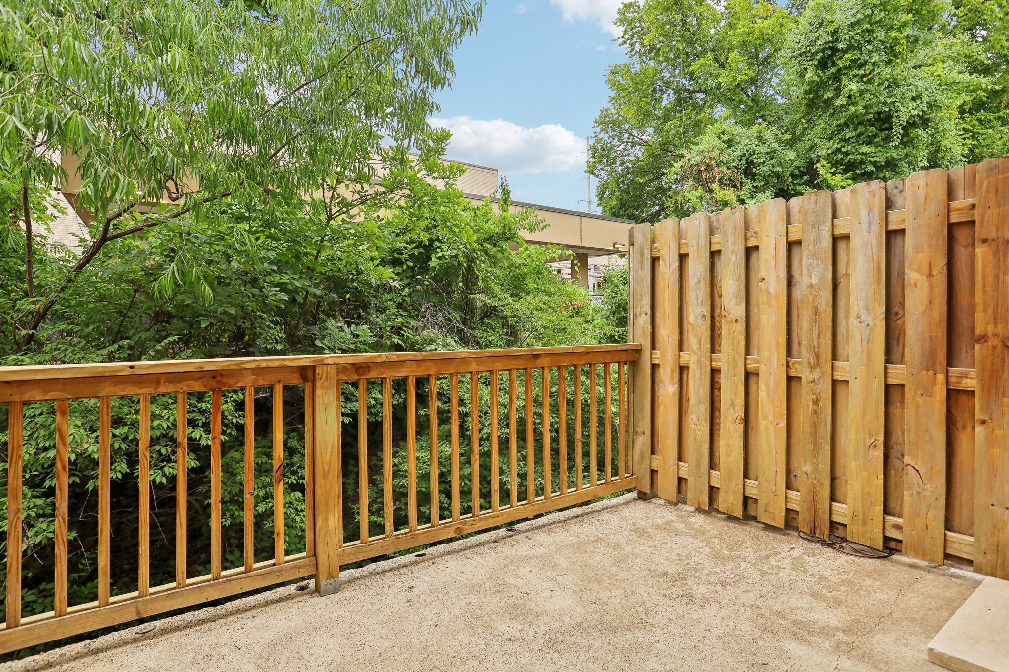 a view of a wooden fence