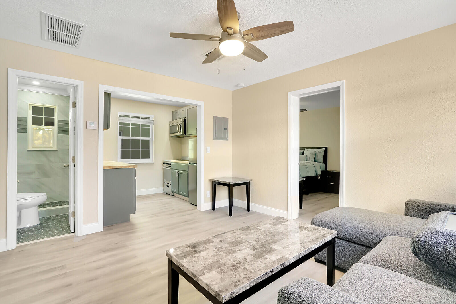 a living room with furniture and a table