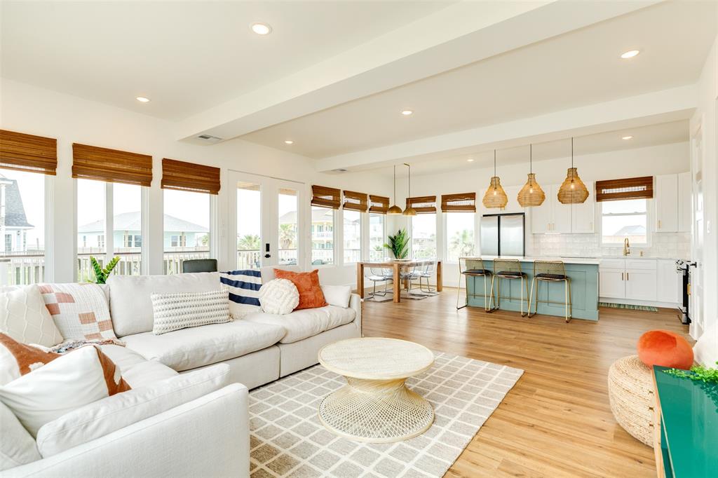 a living room with furniture and a table