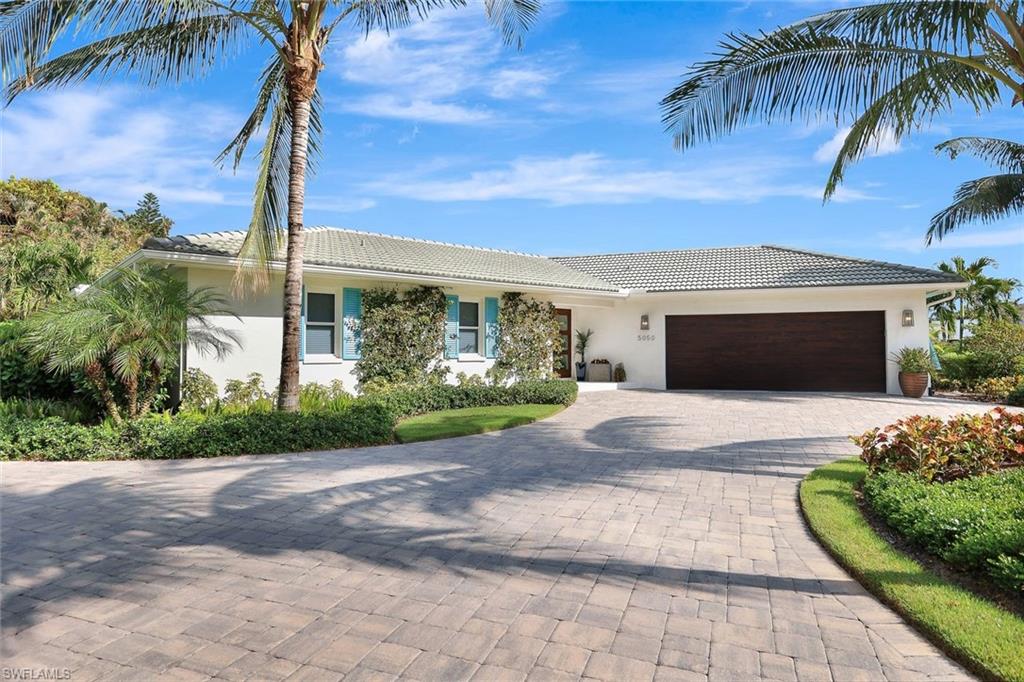 Ranch-style house with a garage