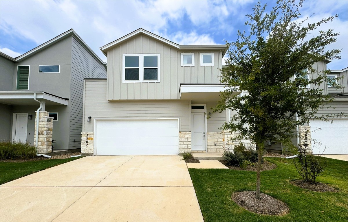 a front view of house with yard