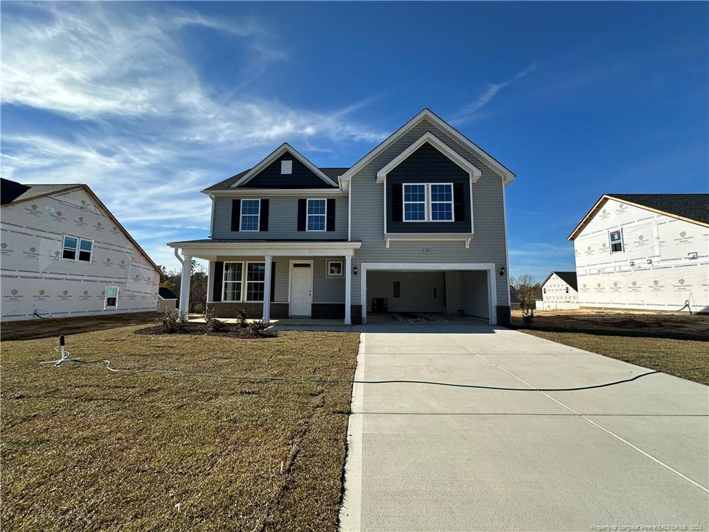 a view of a house with yard