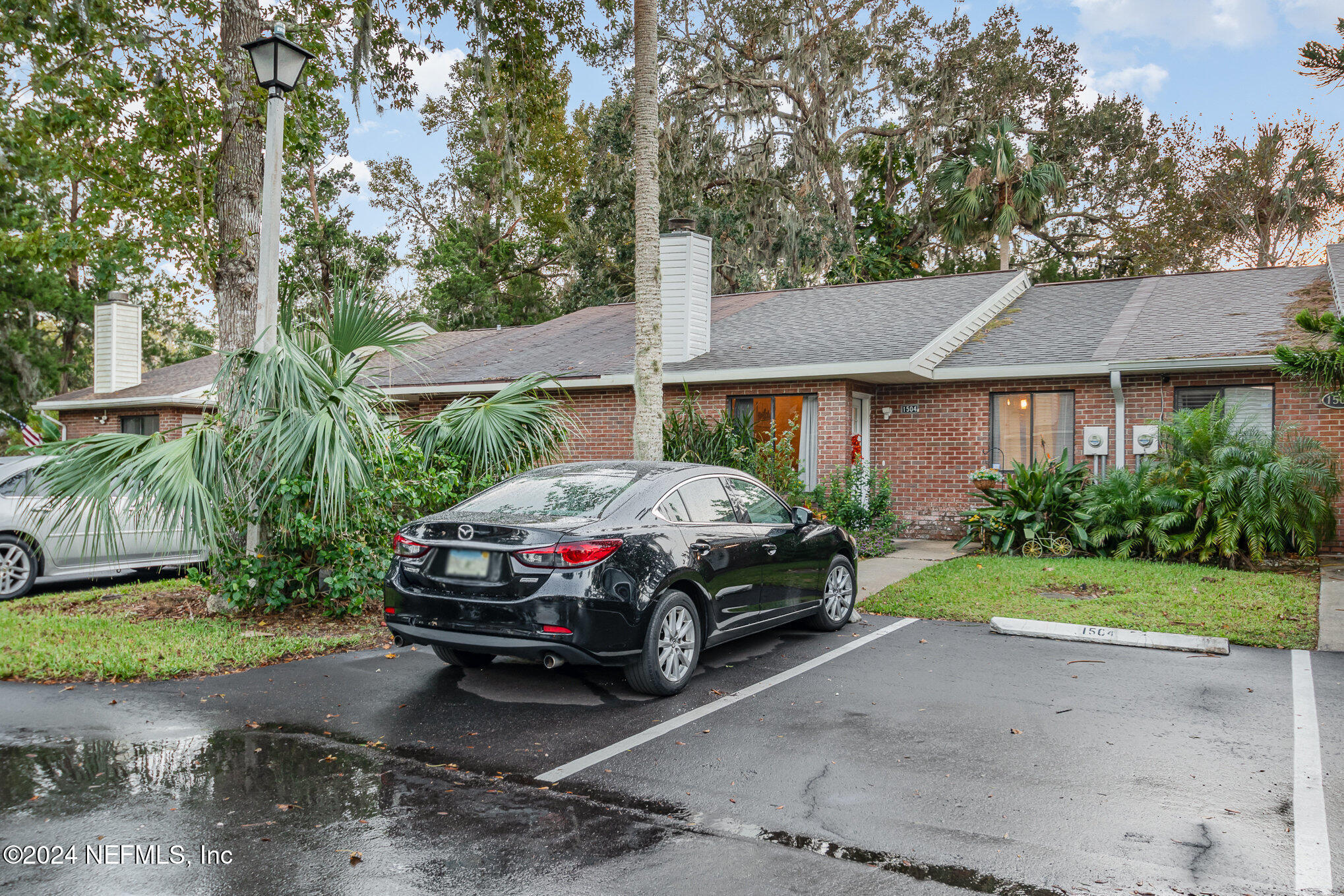 a car parked in front of a house