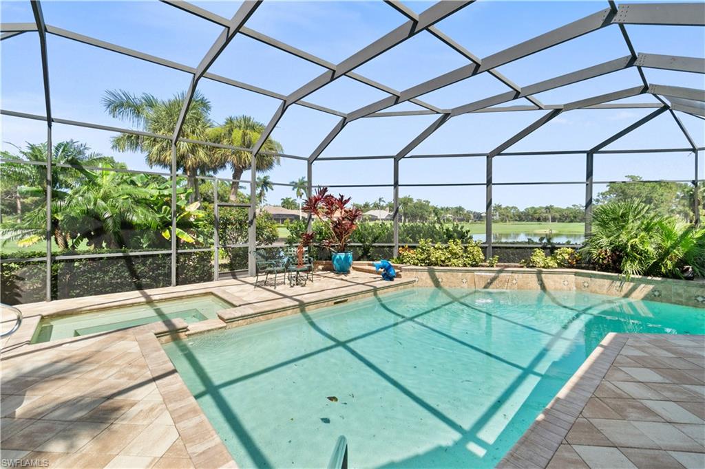 a view of a swimming pool with a patio