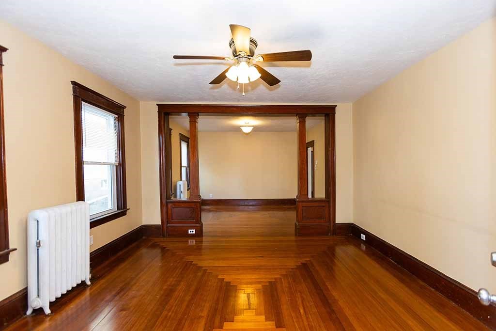 a view of gallery with wooden floor