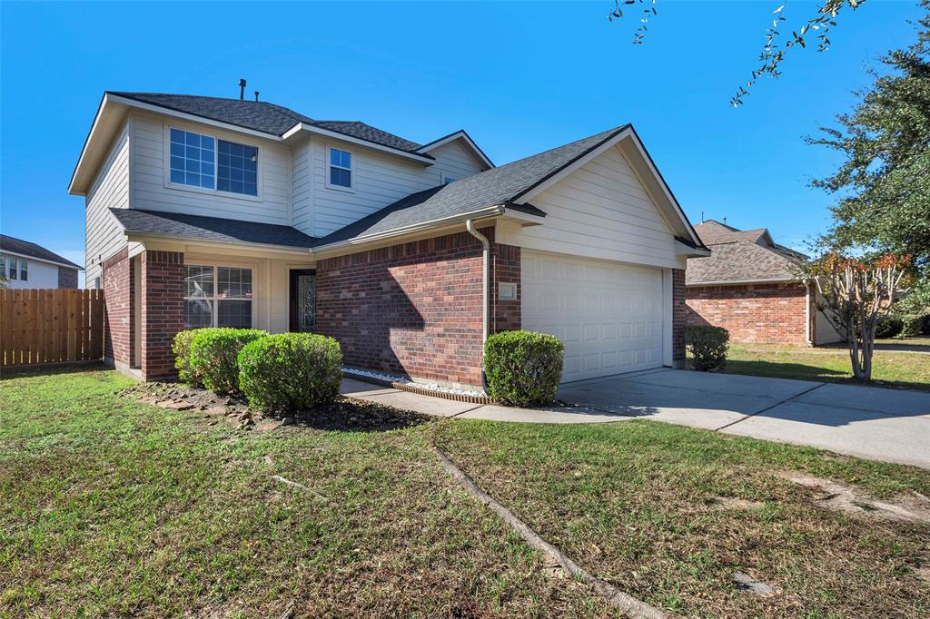 Welcome home to 8926 Farm Ridge Lane Humble, TX 77338