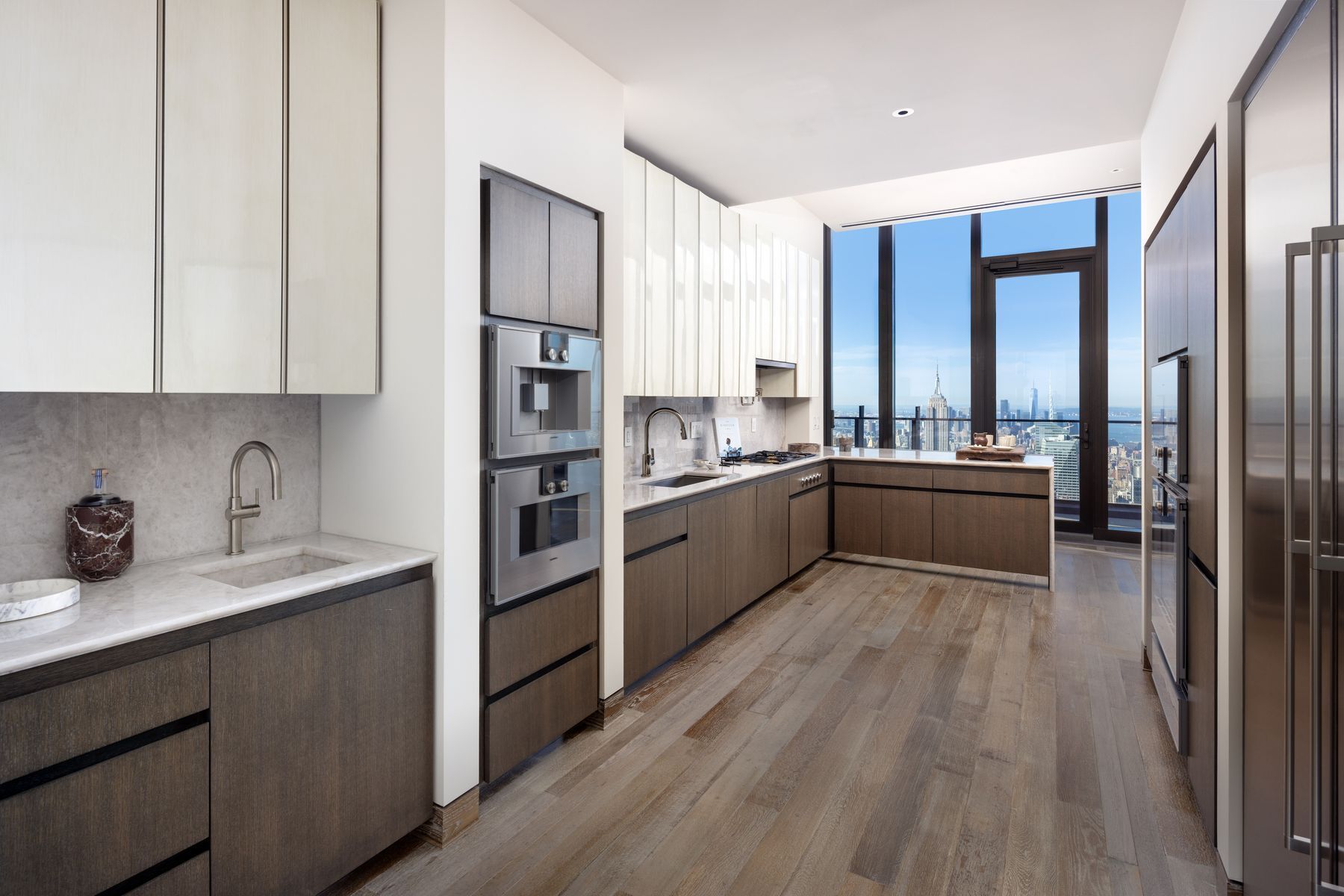 a kitchen with stainless steel appliances granite countertop a sink counter space cabinets and appliances