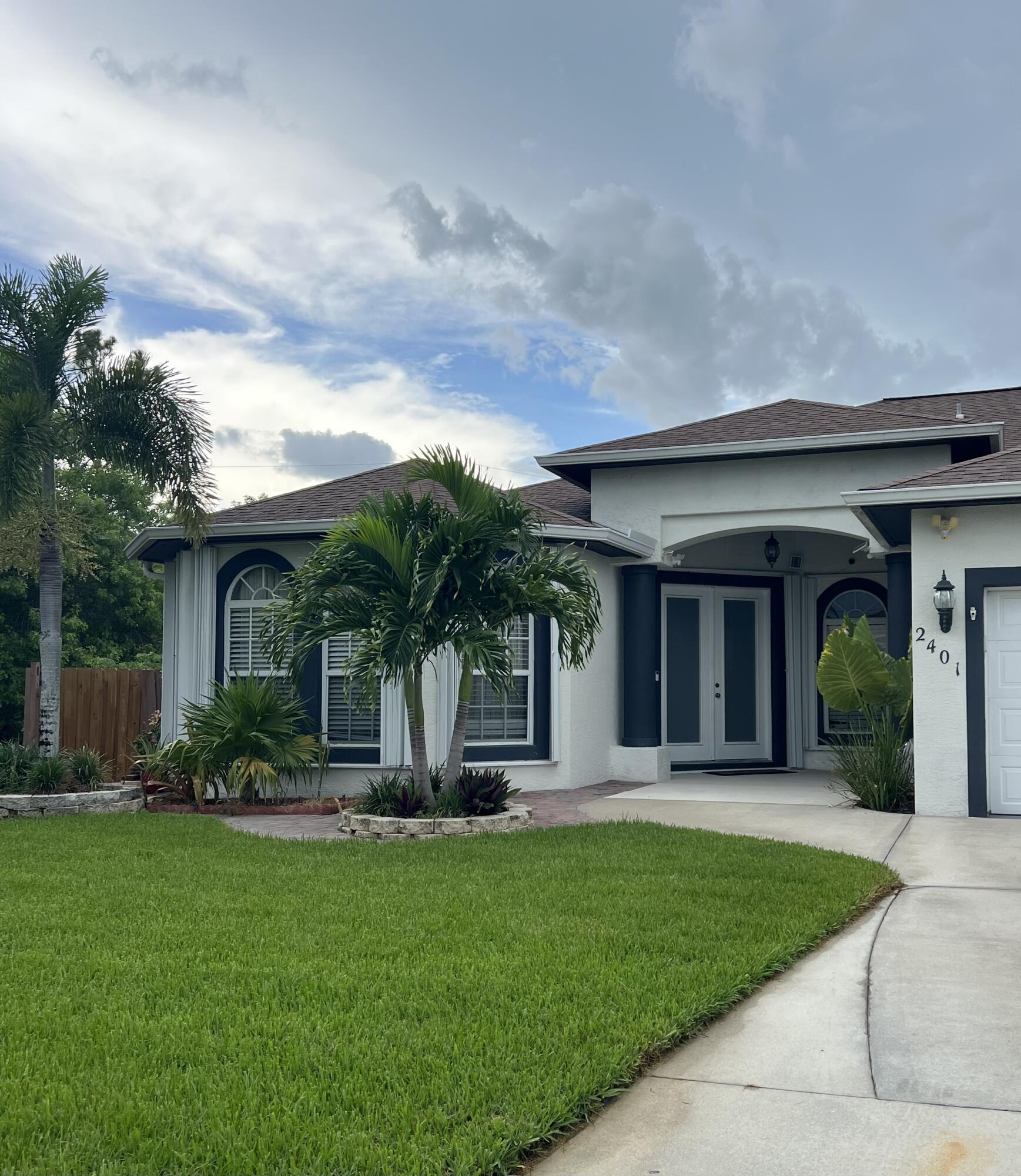 front view of a house with a yard