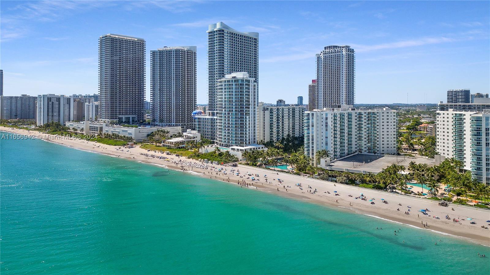 a view of a city with tall buildings